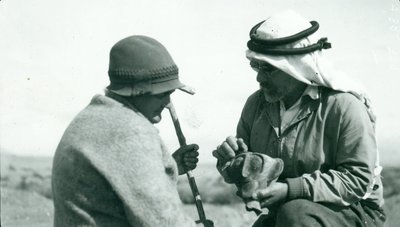 John Garstang showing a piece of Yahudieh Ware pottery chalice to Mrs Garstang by English Photographer